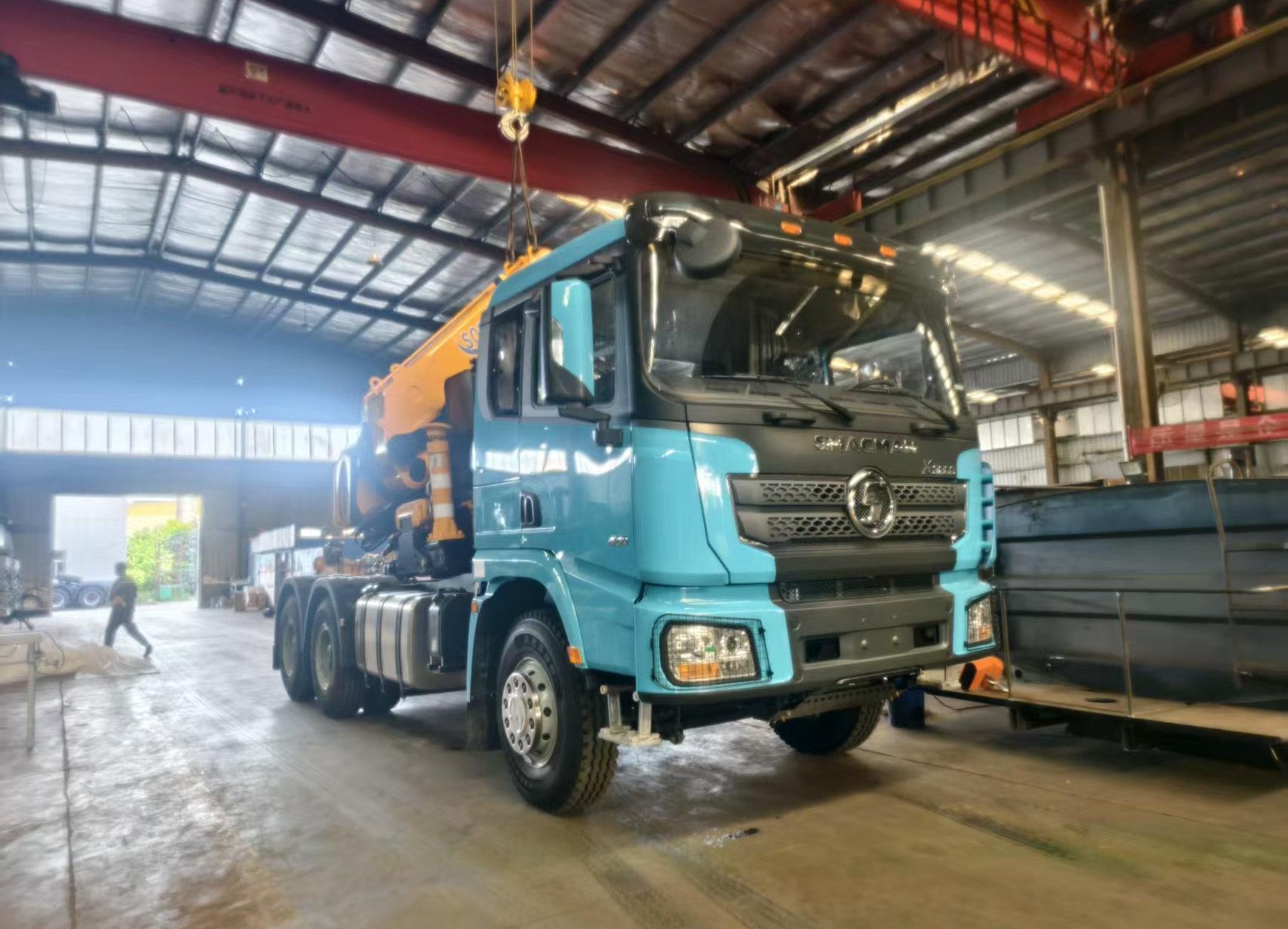 SHACMAN X3000 Cyan Blue – The Ultimate Multi-Tasker for Heavy Lifting